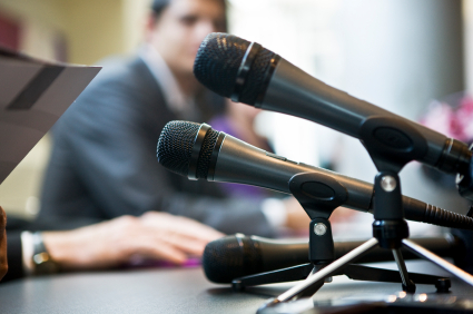 microphones on a press conference table